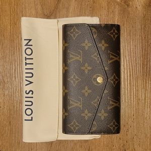 Brand new! Authentic Louis Vuitton Sarah wallet. (Original price is 720 + tax.)